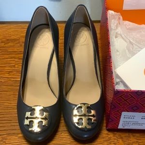 Tory Burch.  Navy pumps